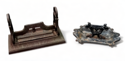 A 19th century cast iron boot scraper - of rectangular form with loop handles and lift out tray,
