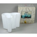 Alvar Aalto, Finnish, 1898-1976, an iitala Savoy vase, in white glass, 50th anniversary edition,