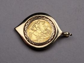 A George V half sovereign - 1912, within a 9ct gold mount, 7.8g