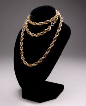 A multi-strand curb-link 9ct gold chain - 62cm long, 32g