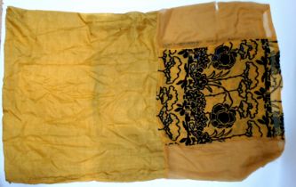 An early 20th century 'Flapper's' dress - golden yellow silk with a blue velvet panel, 97cm long