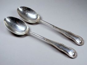 A pair of silver table spoons - Sheffield 1912, John Round & Son Ltd, with gadrooned beading, 190g
