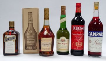 A bottle of Bisquit cognac - boxed, together with a bottle of Campari and three further bottles of