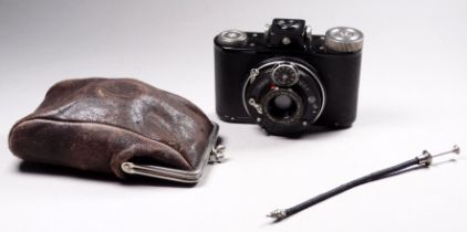 A German Ibsor pocket camera - Ranka in a leather purse case.