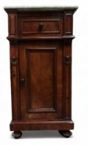 A late 19th century French walnut pot cupboard - with white marble top above a drawer and cupboard