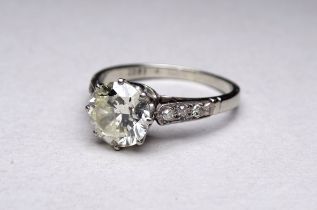 An 18ct white gold solitaire diamond ring - the claw set central stone 2ct approximately within