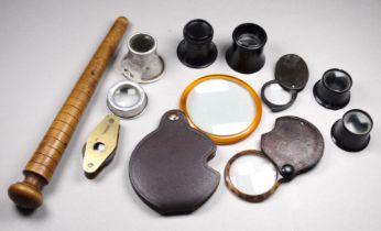 A brass cased jeweller's loupe - with three lenses, together with a small quantity of other loupes