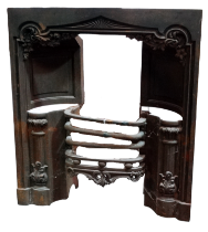 An early Victorian cast iron fire surround - with foliate corners and reeded columns, width 82cm,