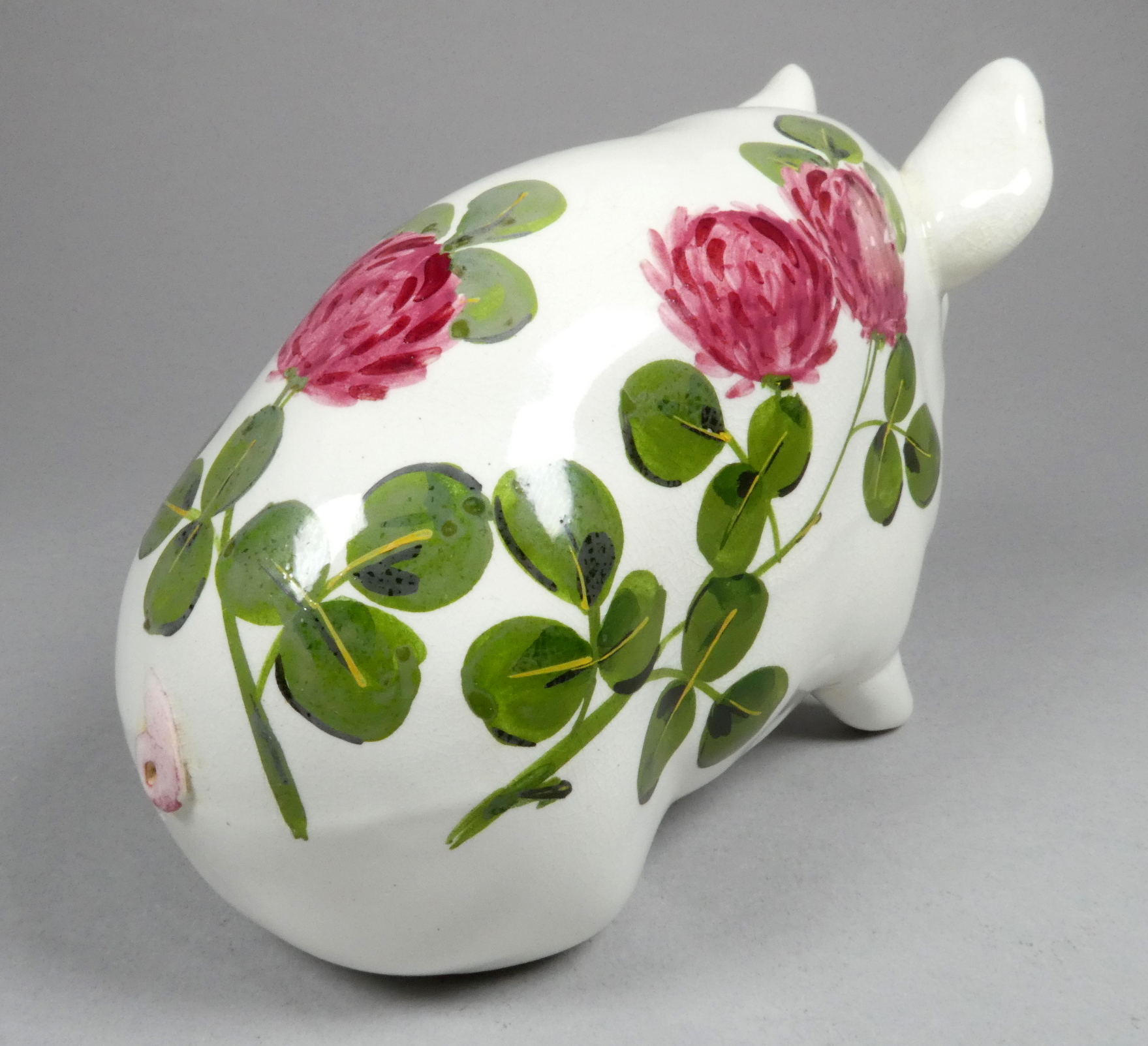 A Wemyss ware pottery pig - decorated with clover flowers, 17cm wide - Image 4 of 5