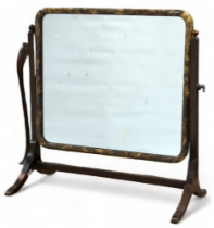 An early 20th century faux tortoiseshell toilet mirror - with a rectangular plate, height 50cm.