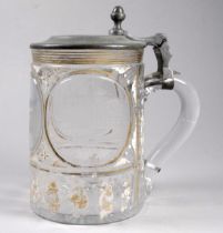 An early 20th century Bohemian lidded mug - engraved with images Kiel, Bellevue and Felsekeller, the