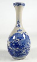 A 19th century Chinese blue and white onion shaped vase with narrow neck - decorated with flowers,