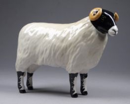 A Beswick black faced ram - 12cm high