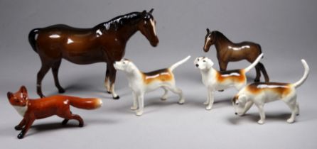 A Beswick group - comprising three hounds and a fox, together with a bay mare and foal, (6)