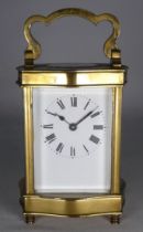 An early 20th century French carriage timepiece - the white enamel dial set out in Roman numerals,