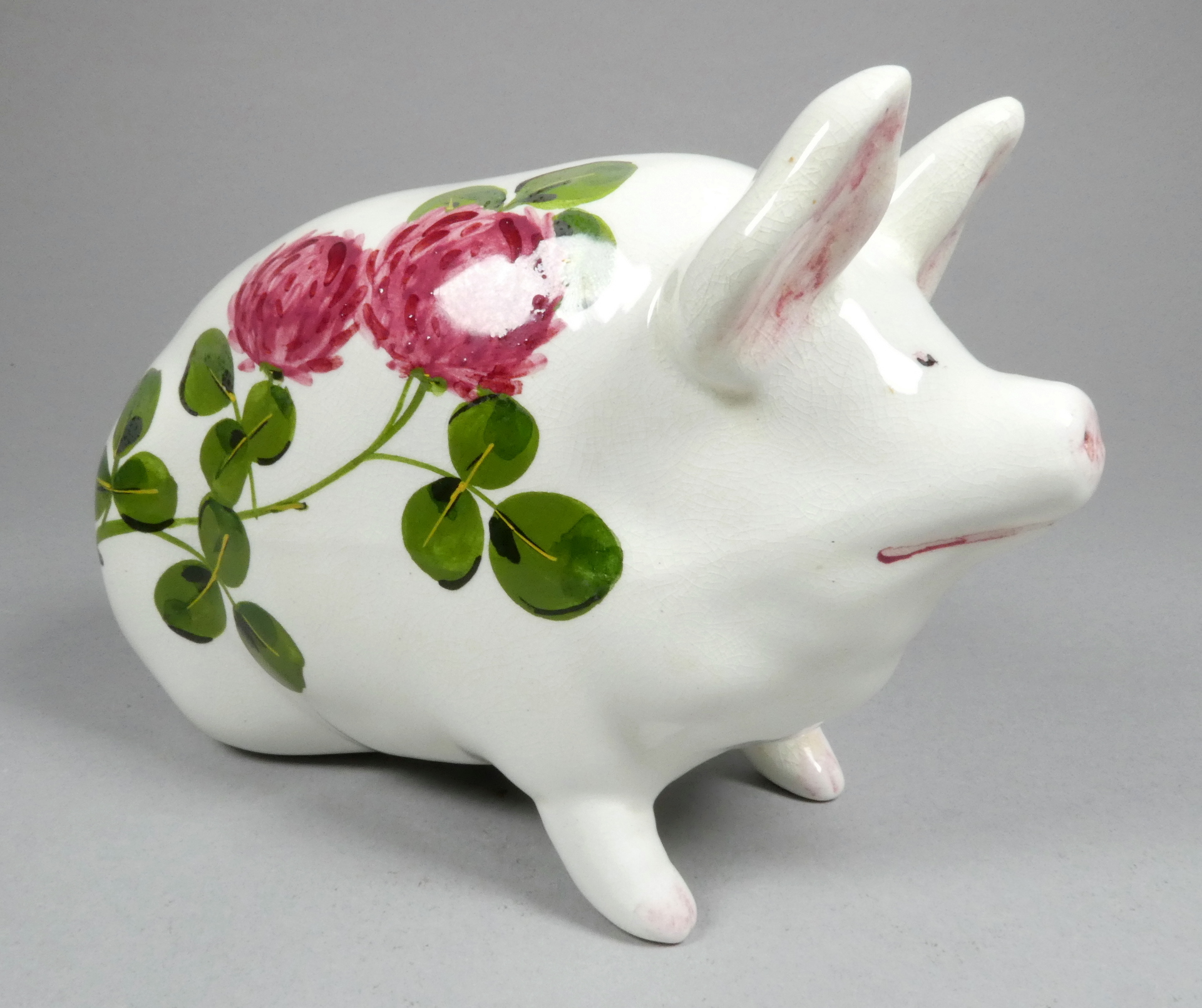 A Wemyss ware pottery pig - decorated with clover flowers, 17cm wide - Image 3 of 5