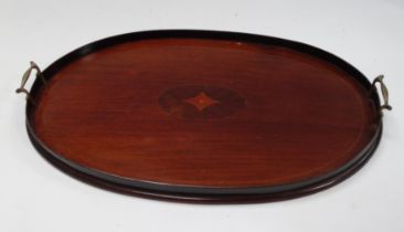 An Edwardian mahogany oval tray - inlaid to centre with a gallery and twin brass handles, 60 x