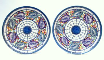 A pair of Crown Ducal chargers by Charlotte Rhead - Tarragona pattern in blue purple colourway,