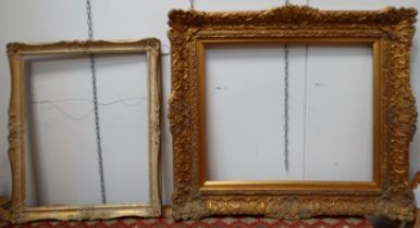 A 20th century gilt picture frame, Of swept design with scrolls and foliage, Rebate size 51cm x 62cm