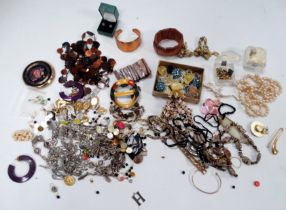 A quantity of costume jewellery - to include a pair of gilt metal opal earstuds and a silver charm