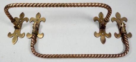 A pair of 19th century contorted brass pew ends - width 30cm.