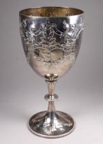 A Victorian silver trophy cup - London 1875, Richards & Brown (Edward Charles Brown), decorated with