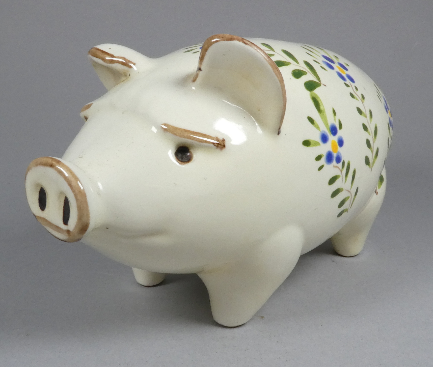 A Quimper pottery piggy bank - decorated with flowers, 21cm wide, together with another larger - Image 8 of 8