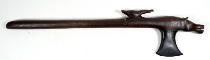 A ceremonial hardwood axe - the head modelled as a hippopotamus with a bird on its back, length