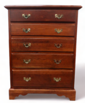 A Georgian style chest of drawers - the rectangular top above an arrangement of five graduated