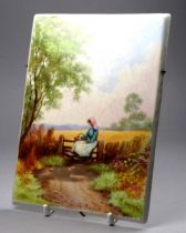 An early 20th century porcelain plaque - The Cornfield, signed J E Savage, young woman seated on a