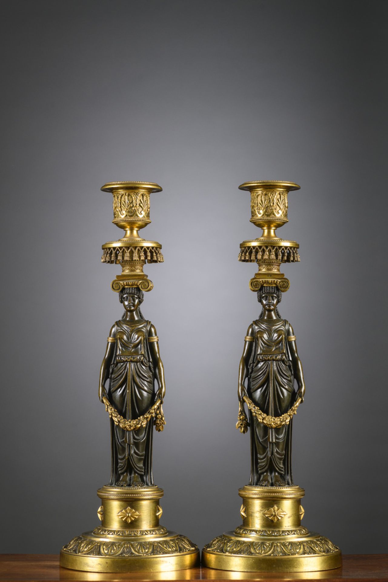 A pair of bronze Empire candlesticks 'Caryatids' (h33cm)