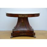 A Charles X mahogany table, signed A. Vangils (75x115x86cm)