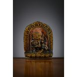 Tibetan carved amulet in black stone 'Jambhala' (4x3x1cm) with traveling altar