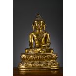 A fine gilt bronze sculpture 'Buddha Shakyamuni', Tibet 15th - 16th century (h 15.3 cm)