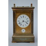 A bronze travel clock, 19th century (16x10x8cm) (*)