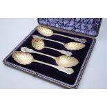 A case with silver spoons, England (L22cm)
