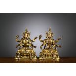 A pair of gilt bronze Bodhisattva's, Sinotibetan 18th century (8.5x5.5x4cm)