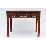 Chinese table in red lacquer with openwork panels, Qing dynasty (75x95x52cm) (*)