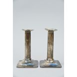 Tiffany: a pair of silver candlesticks (h16.50cm) (total weight 772 grammes) (*)