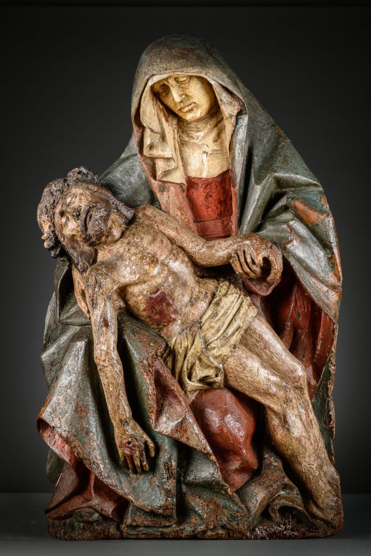 A large Pieta in polychrome wood, 15th - 16th century (90x55cm)