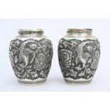 A pair of Persian silver vases (h8.5cm) (weight 296 grammes)