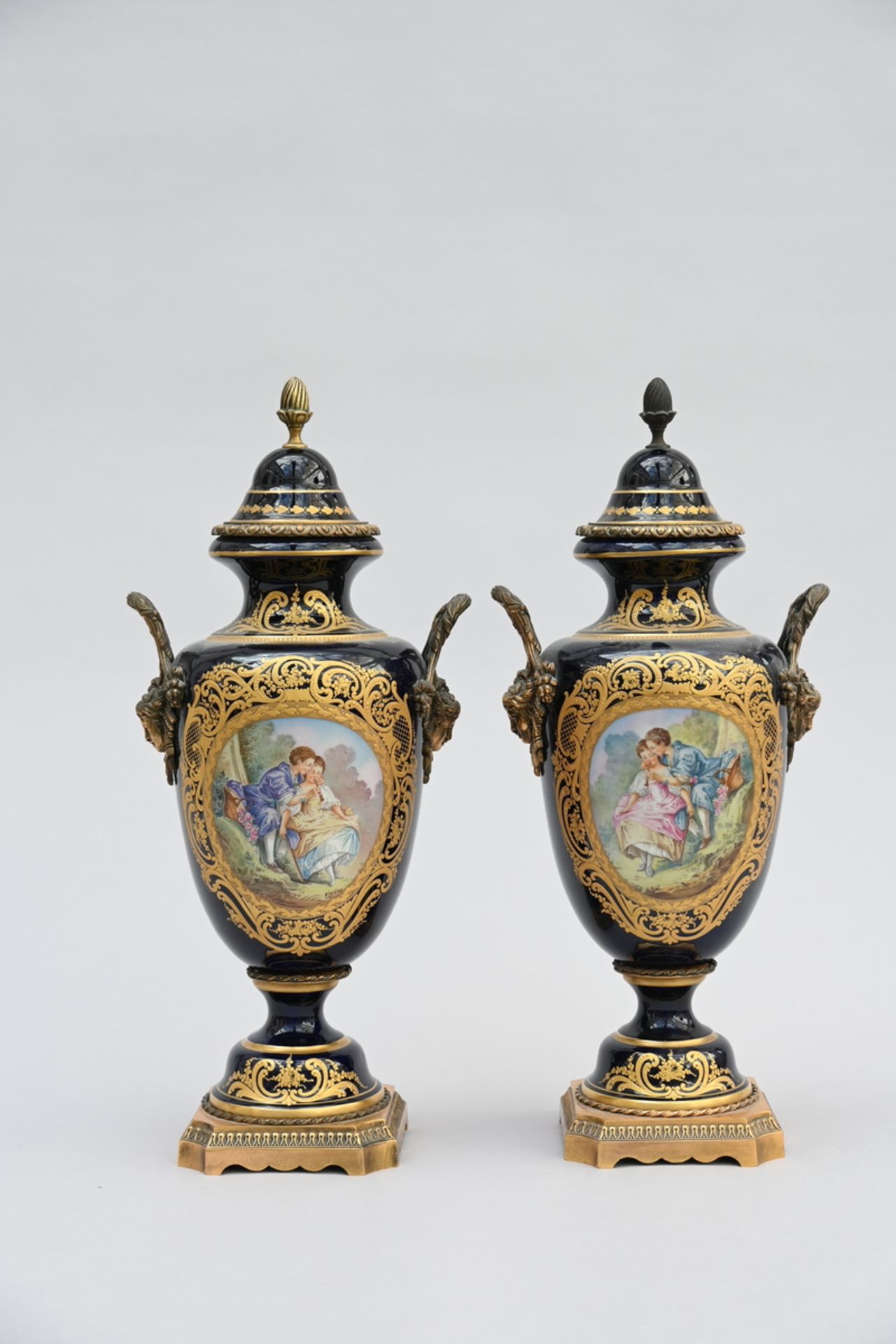 A pair of SËvres porcelain vases with bronze mounts (50cm)