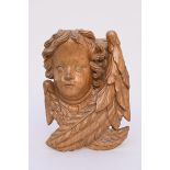 Baroque angel in oak, 17th century (33x25cm)