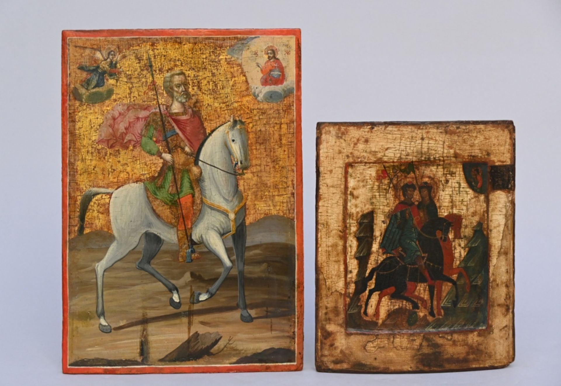 Two Russian icons 'two horsemen' and 'Saint-Michael on horseback' (32x26cm) (44x31cm) (*)