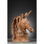 A terracotta bust 'unicorn with crown around the neck' (h42cm) (*)