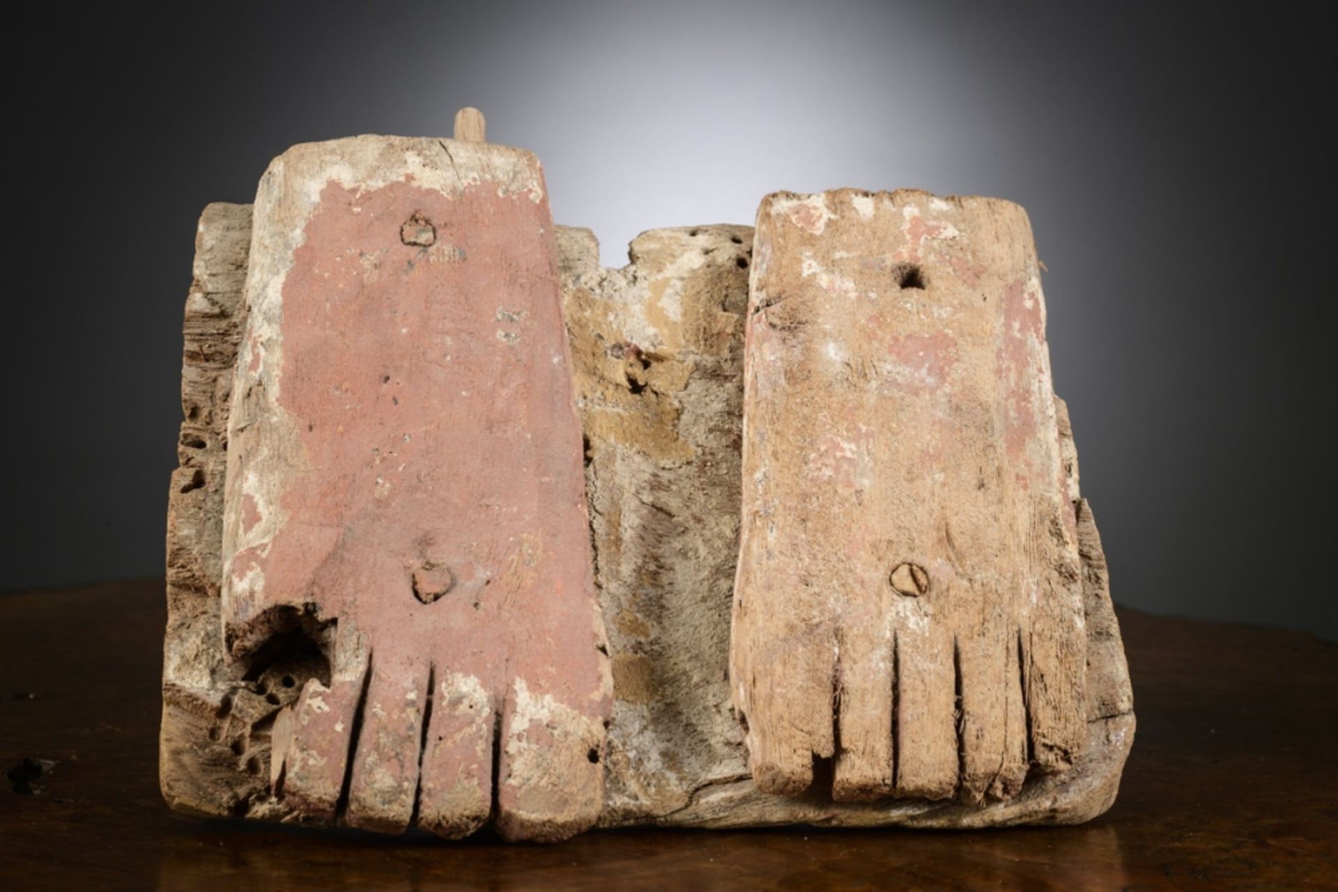 Egyptian fragment in painted wood: foot of coffin (6x26x25cm)