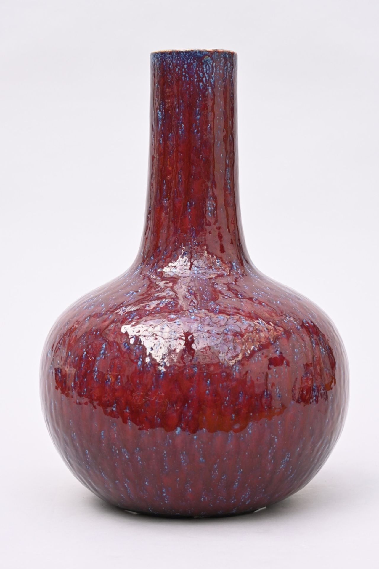 A vase in Chinese porcelain with flambÈ glaze (h 49.5cm)