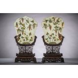 A pair of Chinese table screens with inlaywork on wooden pedestals (44x20x10 cm) (*)
