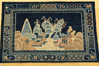A Chinese blue carpet 'landscape' (206x135cm)