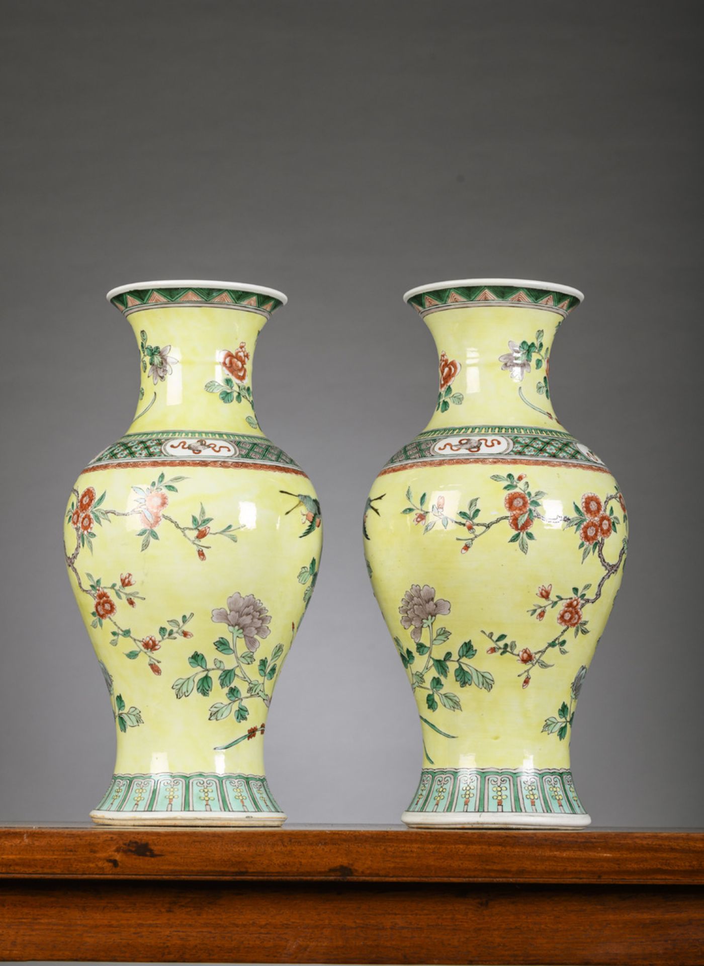 A pair of Chinese famille verte porcelain vases with yellow ground, 19th century (44.5cm) - Image 2 of 5